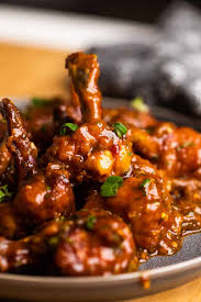 Chicken Lollypop Tossed in Sauce