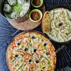 Cheese corn pizza + veg Schezwan Momo + Cold Drink