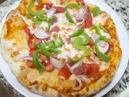 Onion Tomato Capsicum pizaa